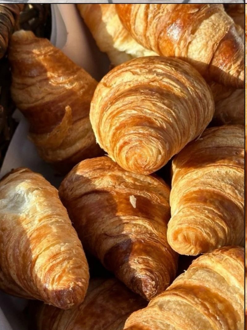 A tray of fresh croissants